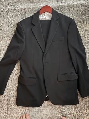 Full two-piece men’s stretch black suit from State and Liberty